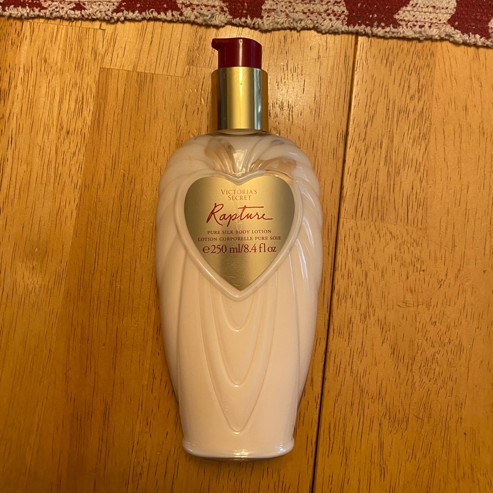 Rapture pure silk body lotion - never used - was a gift- very hard to find